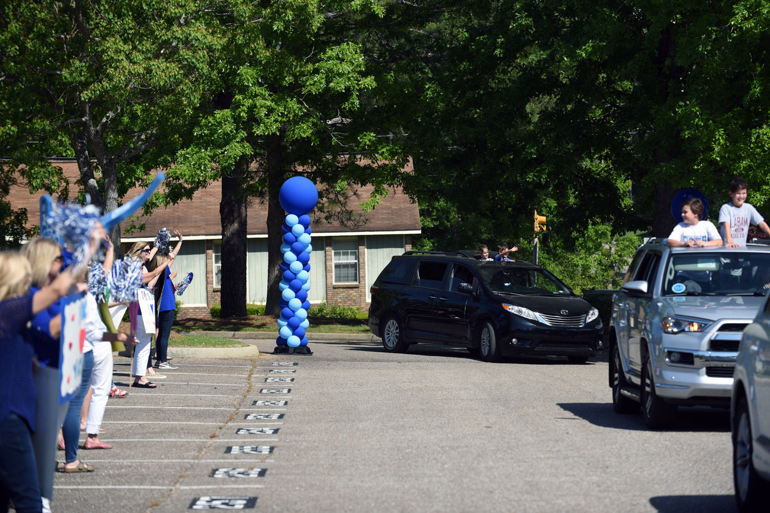 Teachers hold parade for students at Houston Academy